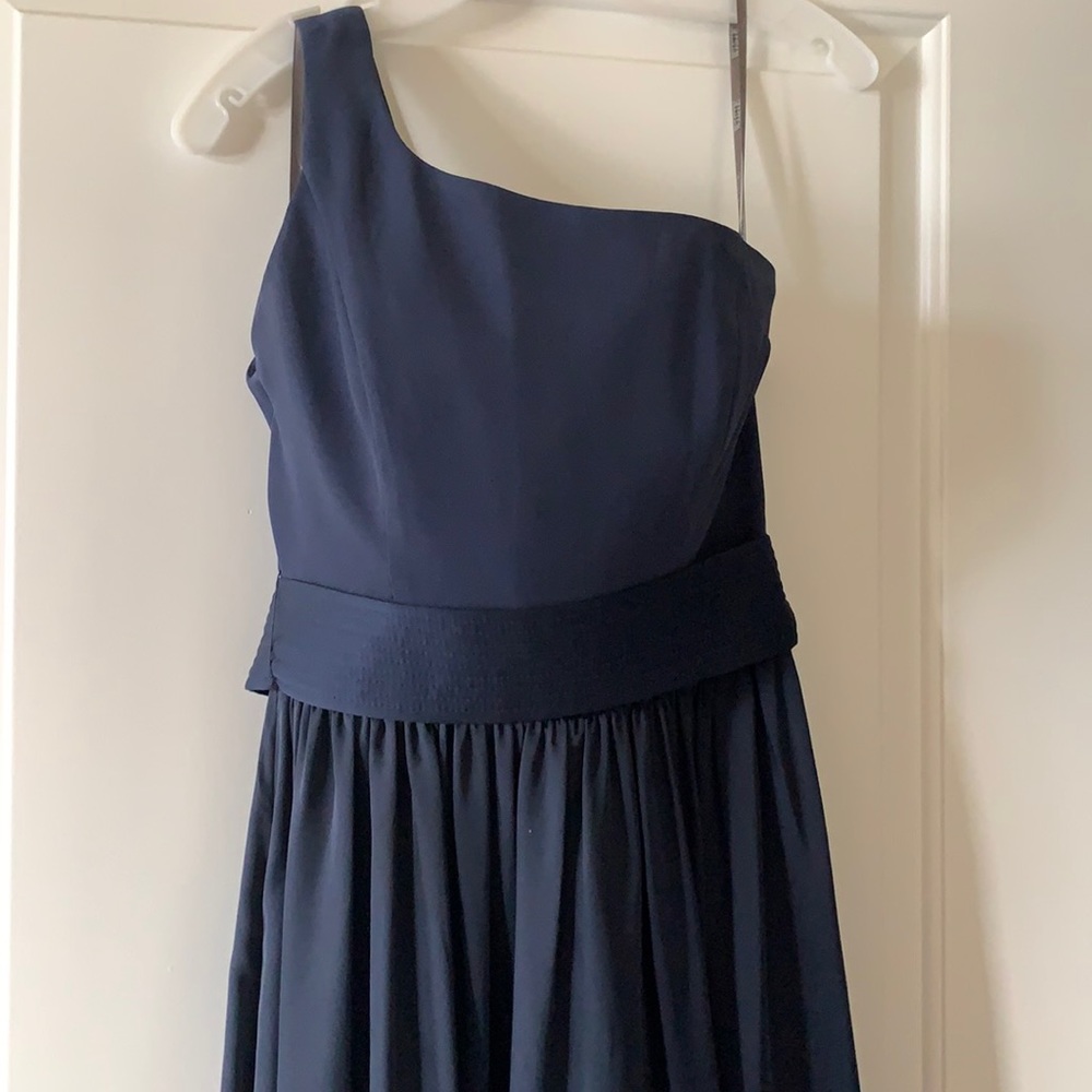 Long flowing dark blue formal dress